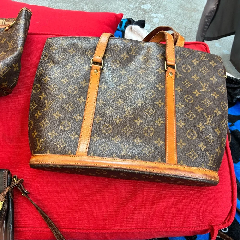 9-Dooney & Burk, 1-Coach, 1- Brahmin & 2- LV bags. ( Selling All) one Price